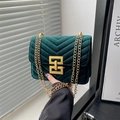 Deep green velvet crossbody bag with V-shaped quilting and gold chain strap - Green