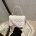 Quilted off-white crossbody bag with golden clasp and triangular stitching - White