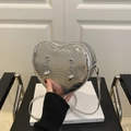 Chic silver heart-shaped crossbody bag with crocodile texture and chain accents - Silver