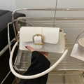 Elegant white leather baguette bag featuring a large polished gold square buckle - White