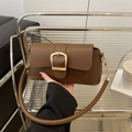 Caramel matte faux leather baguette bag with a large golden buckle and chain detail - Coffee
