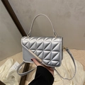 Silver quilted crossbody bag with diamond stitch patterns and metal accents - Silver