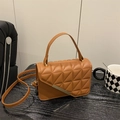 Women's caramel brown quilted crossbody bag with triangle metal trim and top handle - Dark Brown