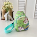 Mint green kids crossbody bag featuring cute unicorn patterns and rainbow elements - Green