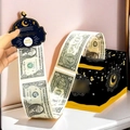 Action shot showing the creative money pull box with star and moon patterns for parties - Black Money Pulling Box / Black