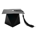 Close-up of black graduation cap gift box with silk tassel on white background - Black