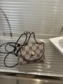 Mini beige canvas purse charm with brown monogram patterns and golden hardware - Gray