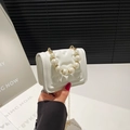 White heart quilted mini handbag with pearl handle and golden chain shoulder strap - White