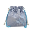 Elegant light blue bucket bag with 3D butterflies and pearl strap on white background - Blue
