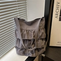 Stylish charcoal grey ruffle layered canvas tote bag for women with minimalist aesthetic - Gray