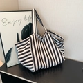 Large capacity striped tote bag with black and white woven pattern for commuting - Black