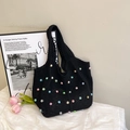 Chic black crochet tote bag with colorful pearl beads on a minimalist background - Black