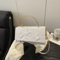 Elegant white lace handbag featuring 3D butterfly embroidery and gold metal handles - White