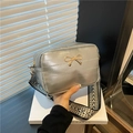 Silver retro crossbody camera bag with metallic bow and colorful woven shoulder strap - Silver