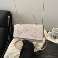 Pink vintage lace handbag with butterfly embroidery and golden circular metal handle - Pink