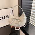 Silver-grey crescent underarm bag with a delicate bow and marble texture finish - White