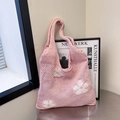 Pink knitted tote bag with white flower patterns and hollow woven aesthetic design - Pink