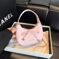 Pink crescent shoulder bag with ribbon detail and textured finish in display box - Pink
