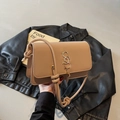 Beige faux leather crossbody bag with golden letter S and fringe tassel detail - Khaki