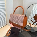 Chic orange faux leather and woven straw crossbody handbag with gold metal detail - Brown