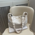 White corduroy crescent crossbody bag with adjustable strap and cute puppy pendant - White