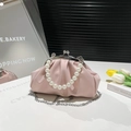 Chic pink pleated cloud bag with elegant pearl handle and silver chain strap - Light Pink