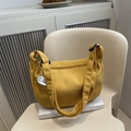 Ginger yellow corduroy crossbody bag with waffle texture and cute puppy pendant - Yellow