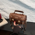 Vintage brown barrel bag with ethnic pattern wide strap and gold hardware accents - Brown