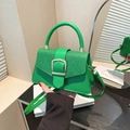 Vibrant green square crossbody bag with shiny finish and oversized silver buckle detail - Green