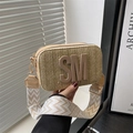 Beige woven straw crossbody bag with SM logo and geometric patterned strap - Khaki