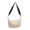 Chic beige half-moon tote with wide black shoulder strap and gold hardware accents - White