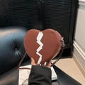 Brown heart-shaped crossbody bag with white zigzag pattern and slim shoulder strap - Brown