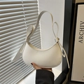 White minimalist hobo shoulder bag with decorative side bows and smooth faux leather finish - White