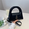 Structured black semi-circle handbag with golden buckle and adjustable shoulder strap - Black