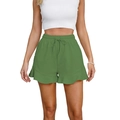 Detail of green cotton linen shorts featuring elastic drawstring waist and ruffle hemline - S / Grass Green