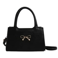 French style black trapezoid crossbody bag with elegant golden bow metal clasp and top handle - Black