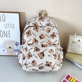 Cream canvas backpack featuring all-over cartoon capybara prints and main compartment - Beige