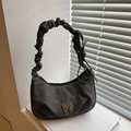 Dark gray pleated crescent bag with a silver butterfly charm and a ruched shoulder strap - Black