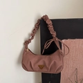 Brown textured pleated underarm bag with iconic triangular metal plaque detail - Dark Brown