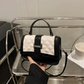 Quilted black and white crossbody bag with classic chain and metallic clasp detail - White and Black
