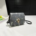 Grey floral embroidered crossbody bag with an elegant golden clasp and leather strap - Black
