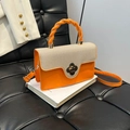 Bolso minimalista de cuero naranja y tweed con hebilla floral y asa en espiral - Naranja
