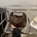 Dark brown snake-patterned pillow bag with gold hardware and adjustable strap - Brown