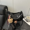 Minimalist black patent leather pillow bag with cute bear charm and woven knot strap - Standard Type / Black