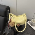 Pale yellow patent leather pillow bag with plush bear charm and knotted strap - Standard Type / Yellow