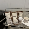 Straw woven tote bag in cream with brown leather trim and cartoon cat embroidery - Without Pendant / Brown