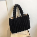 Chic black plush tote bag with spherical top handles and vertical striped fuzzy texture - Black