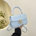 Light blue faux leather crossbody bag with double-ring gold buckle and top handle - Blue