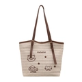 Grand sac cabas en paille tissée beige avec bandoulières en cuir et broderie chat - Café Sans Ornement