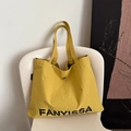Ginger yellow canvas tote bag with black letter print and metal snap button closure - Yellow